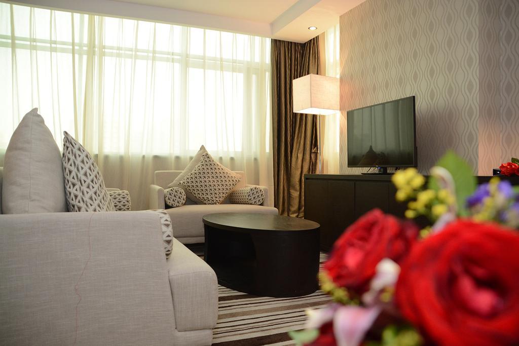 Dongguan Junyue Hotel Quarto foto
