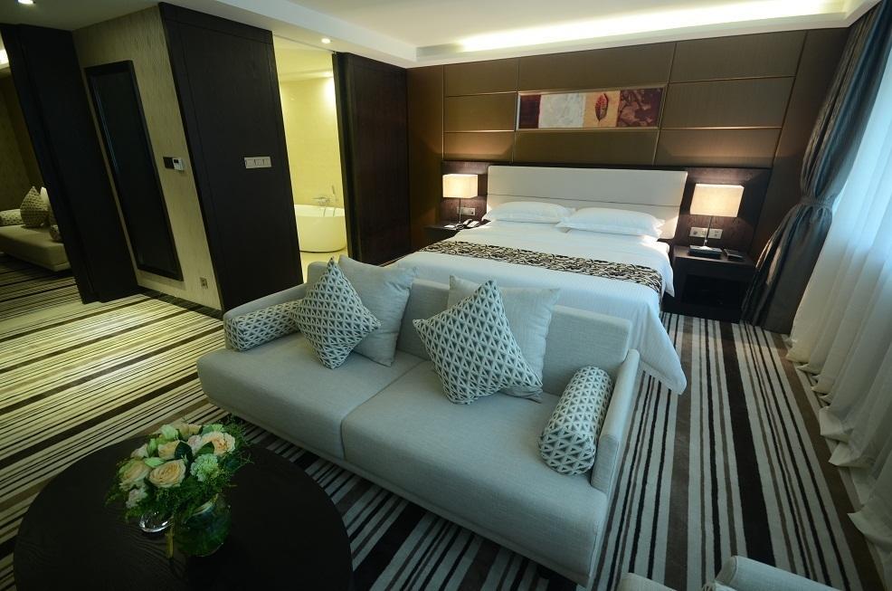 Dongguan Junyue Hotel Quarto foto