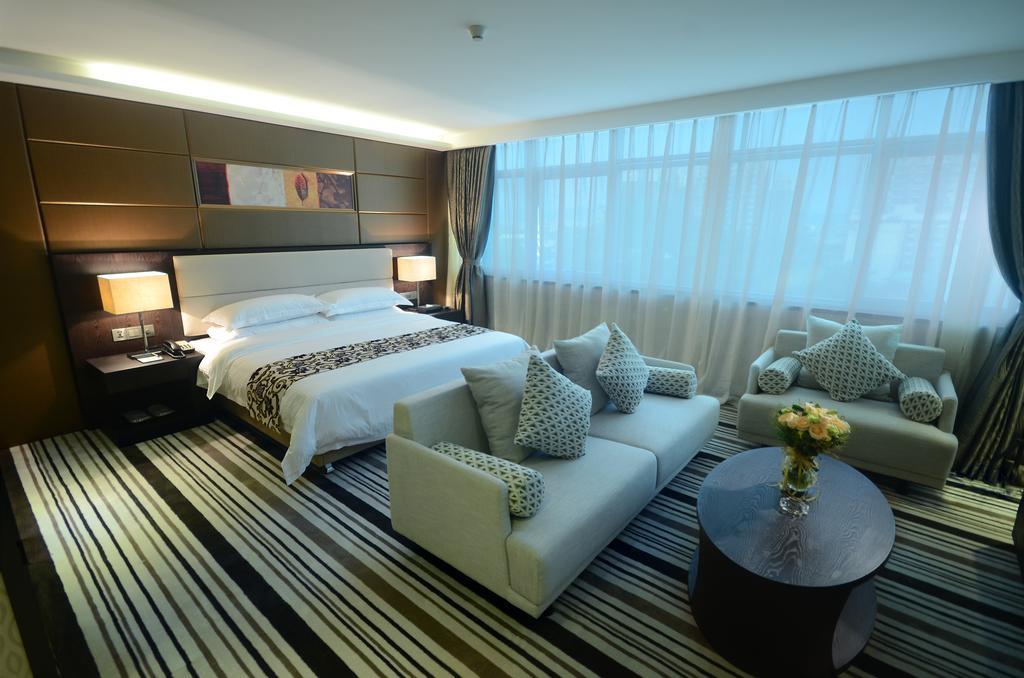 Dongguan Junyue Hotel Quarto foto