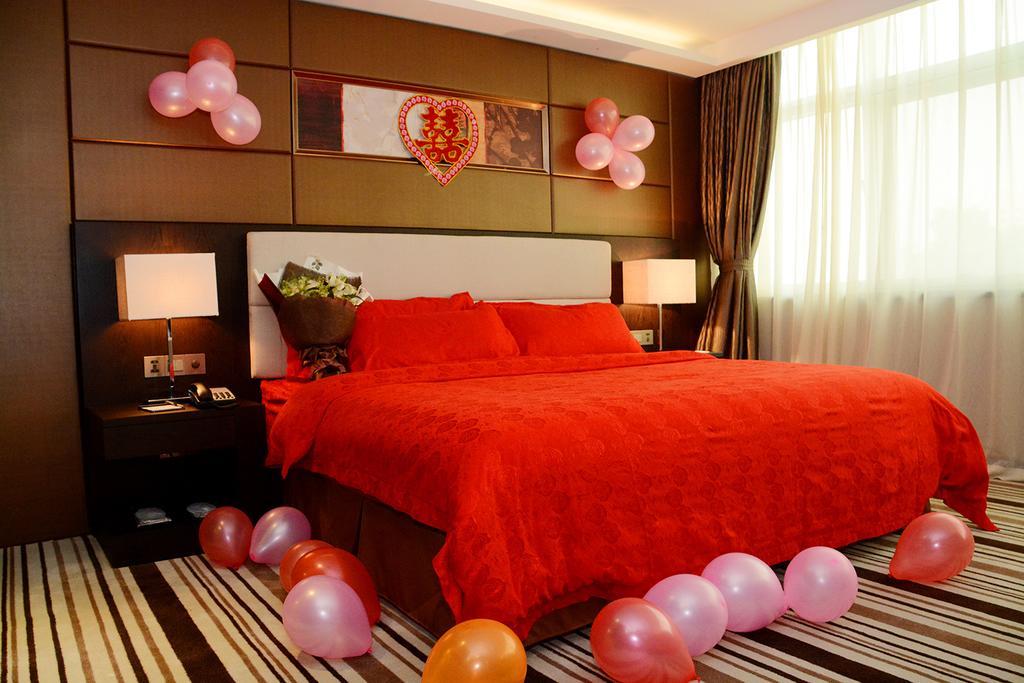 Dongguan Junyue Hotel Quarto foto