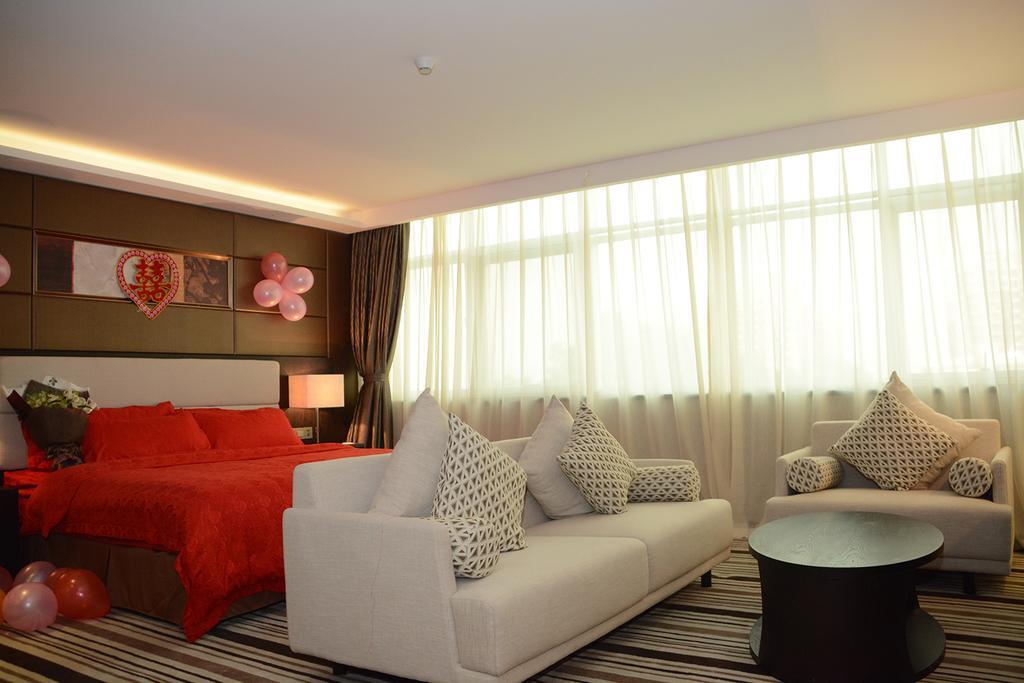 Dongguan Junyue Hotel Quarto foto