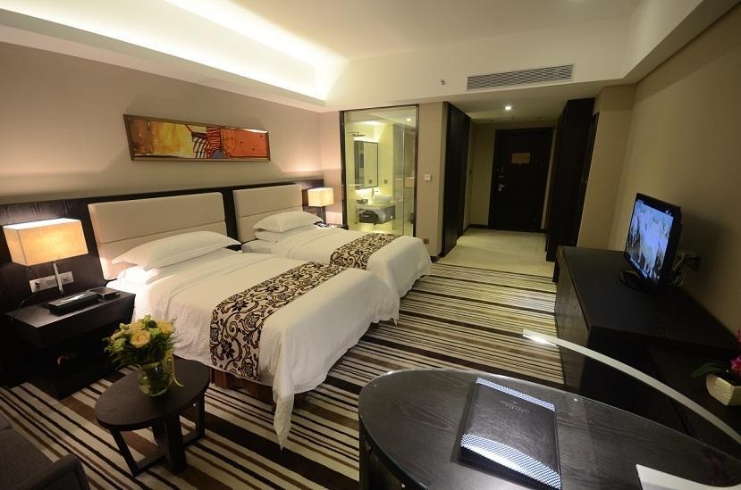 Dongguan Junyue Hotel Quarto foto